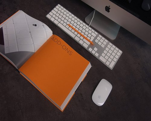 Minimalist home workspace setup with ergonomic design principles applied